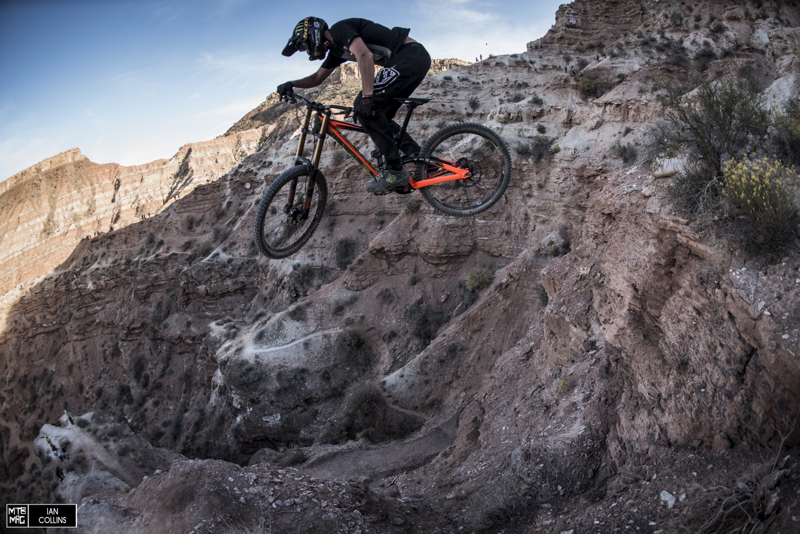 Brendog - 1 foot contact patch to land on and about 60 foot drop on his right. World Cup precision. It's insane how non-challant he is. 