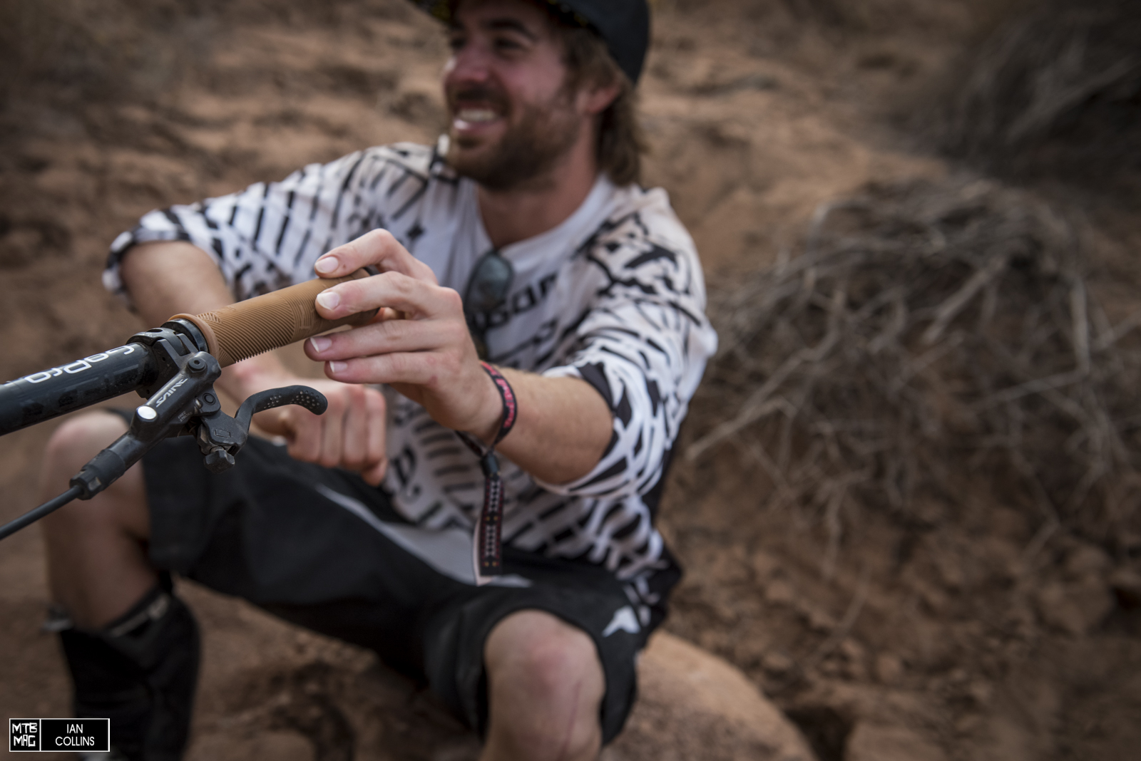 Sensus Disisdaboss clamp on grips.  Andreu Lacondeguy's signature grip.  Saint Brake levers and a big grin.